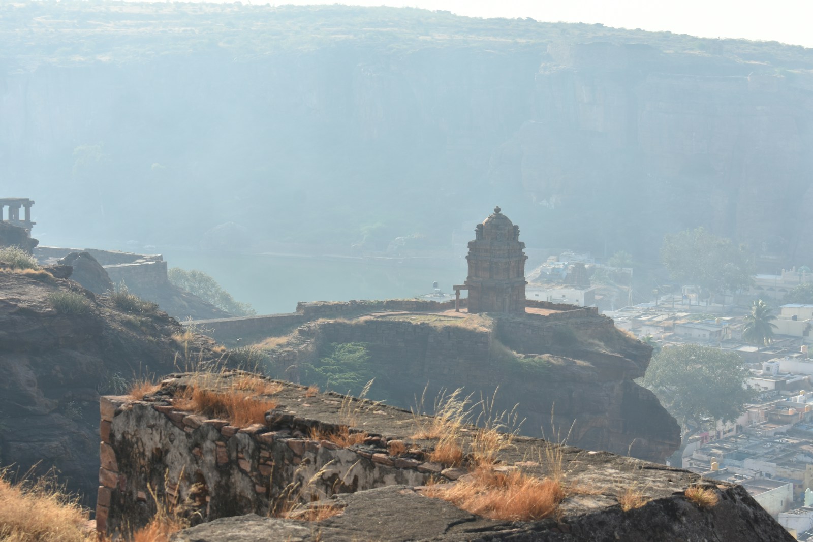 a view of a city from the top of a hill